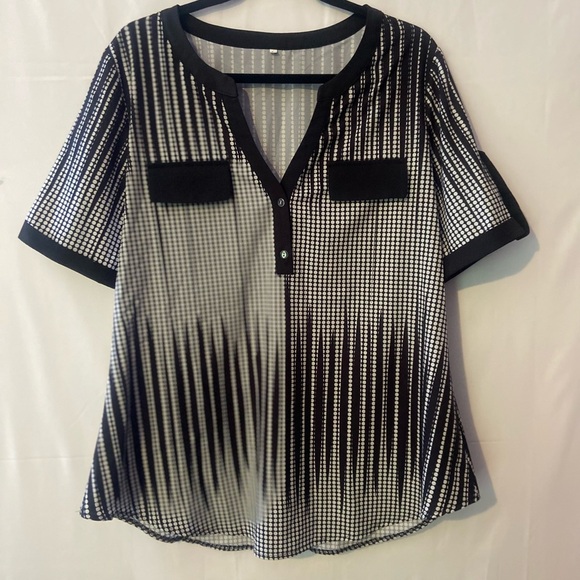 Size Large top feels silky and cool. Light. Dress shirt, short sleeve, loose. - Picture 2 of 7